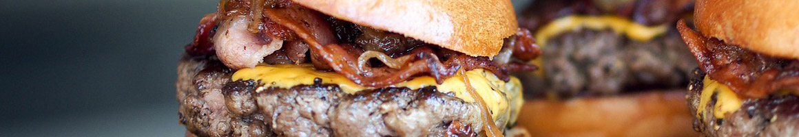 Eating Burger at Minden Meat and Deli restaurant in Minden, NV.